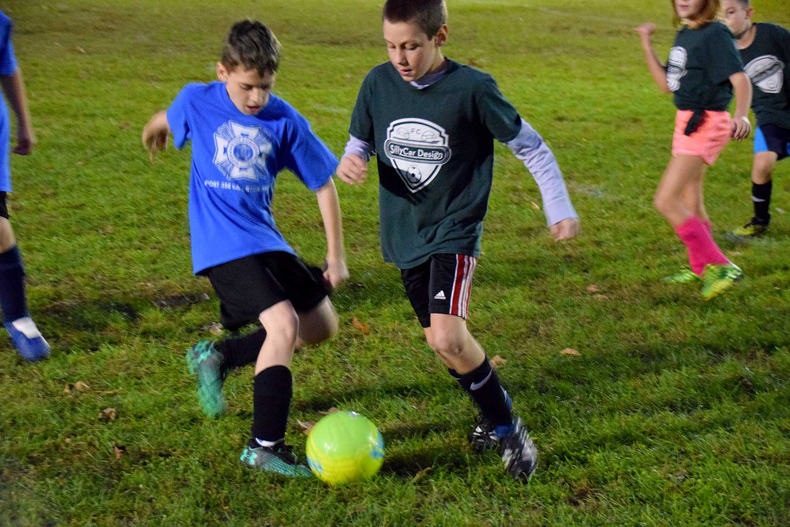 Photo of kids playing soccer on team SillyCar Design at the Rec Field in Ballston Spa.