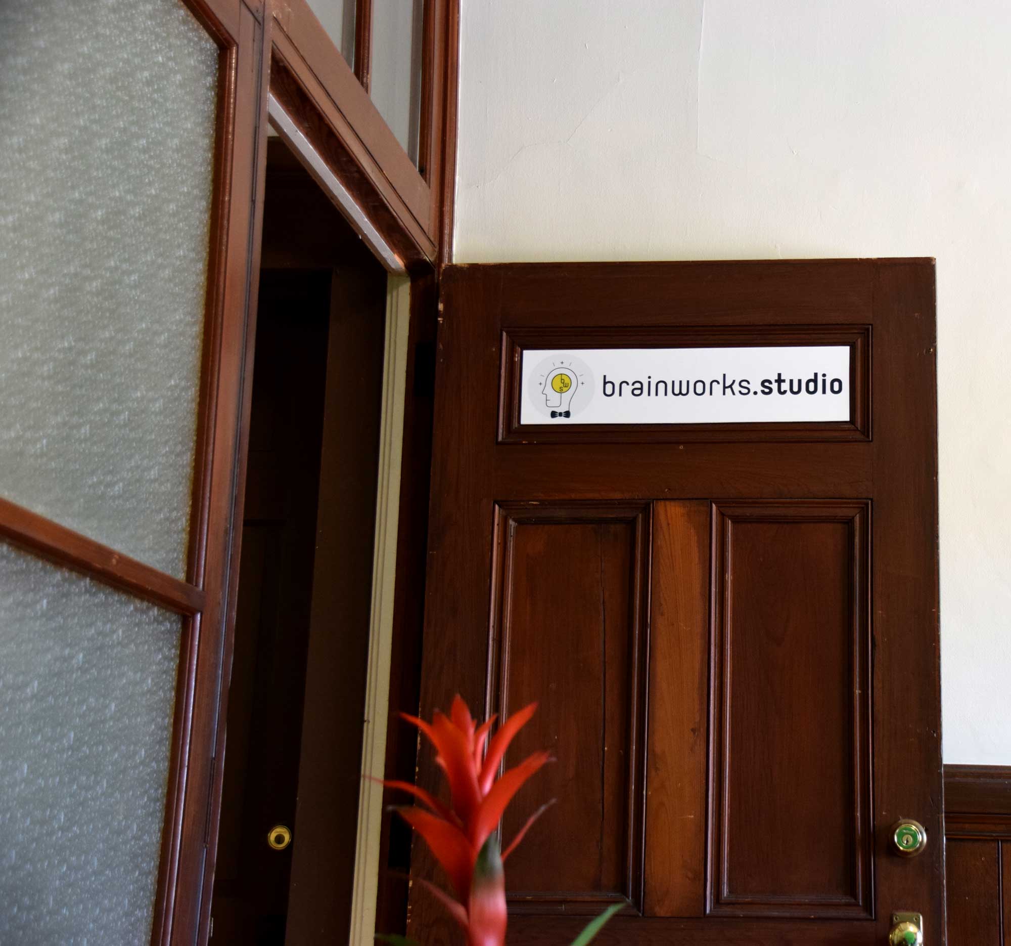 Photo of door signage for Brainworks Studio.