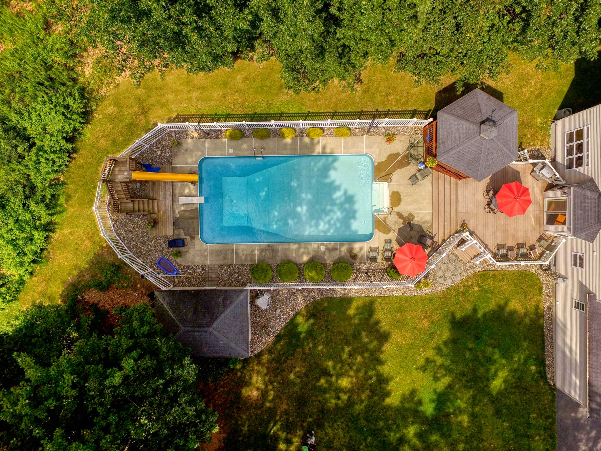SaratogaAerialPhotoAndVideo_9_BSpa Aerial photo looking straight down at indoor pool in backyard of property in Ballston Spa, New York.